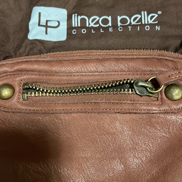 New, LINEA PELLE leather wristlet. Inside zip pocket, front zip, and top zip. - Picture 2 of 7